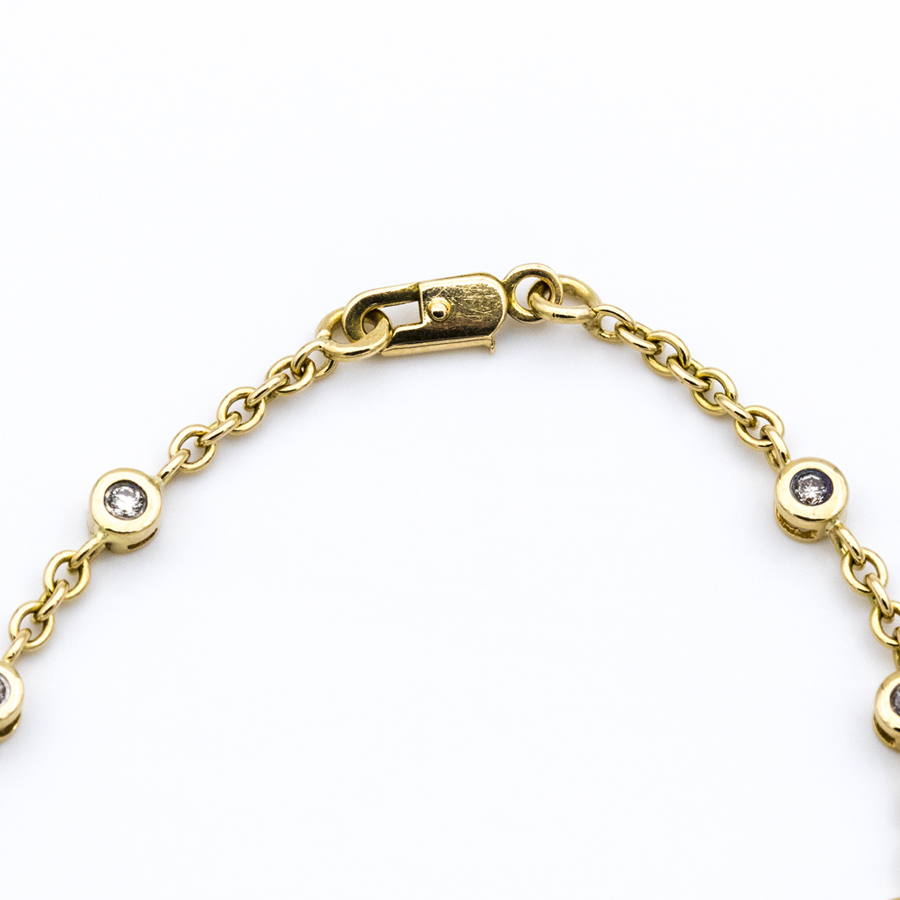 Bracelet mailles forçat en or jaune et 12 diamants