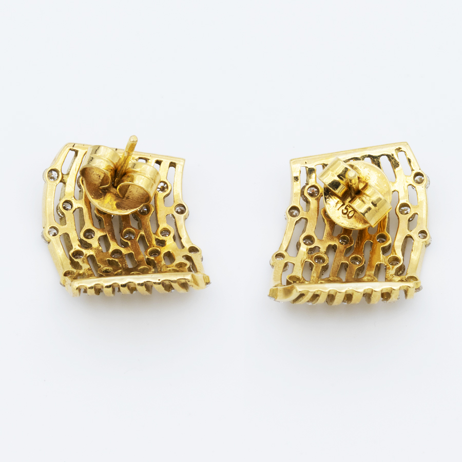 Boucles d’oreilles volutes en or jaune et diamants