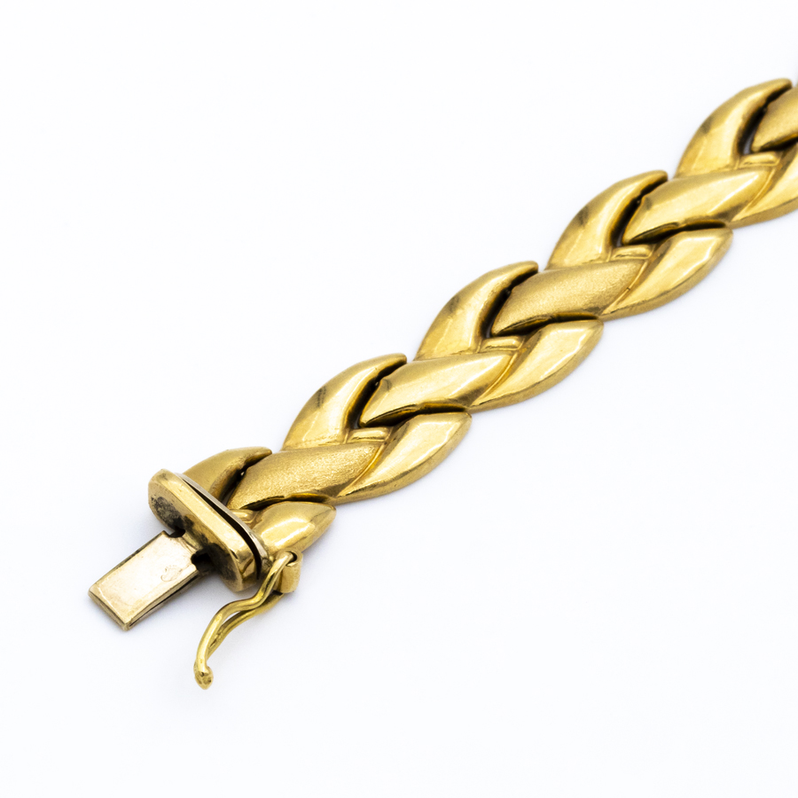 Bracelet plat articulé en or jaune